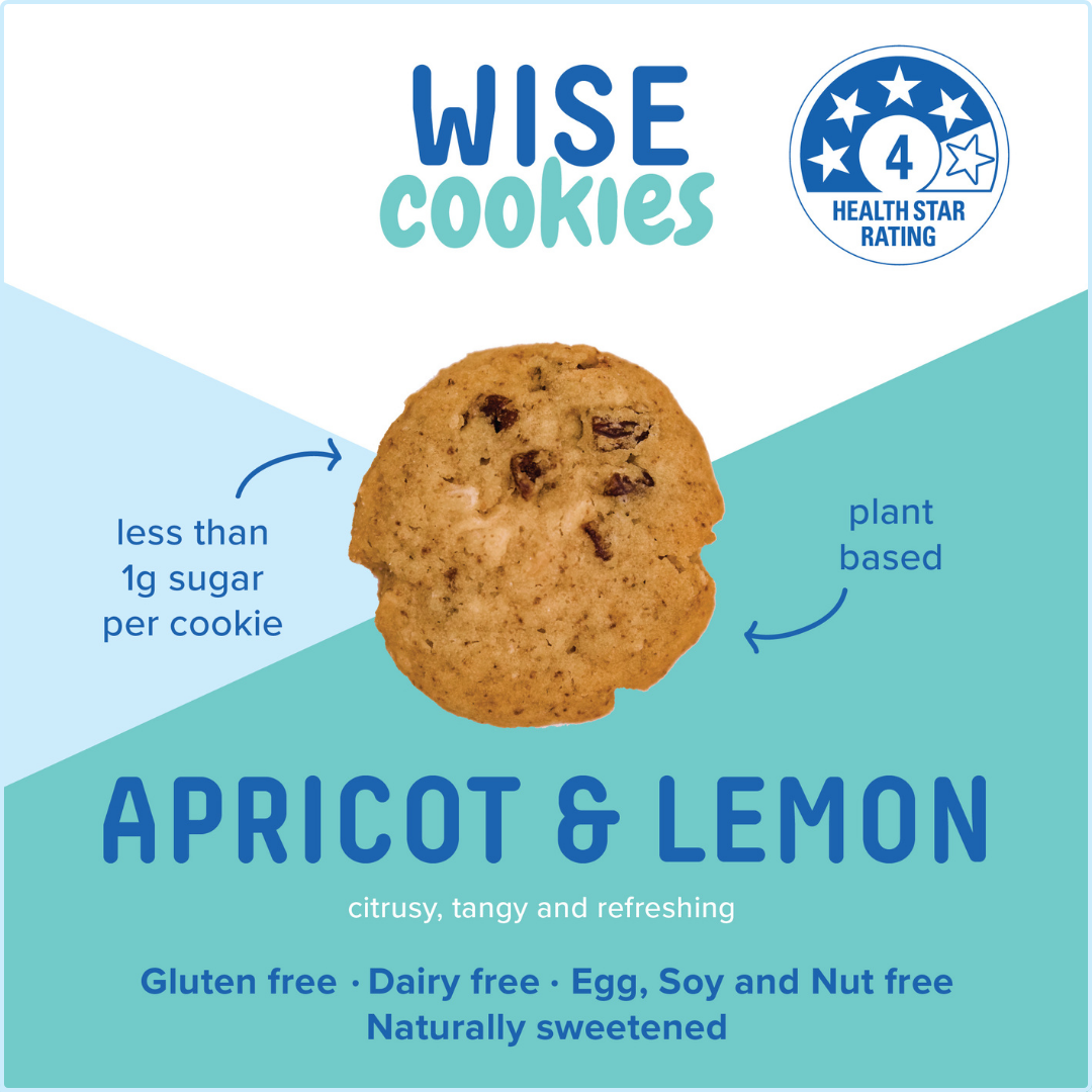 Wisefoods | 240g Glass Gift jar of 4.0 Health Star rated, allergy-friendly, plant based Apricot & Lemon Wise Cookies with a stack of cookies on the right and a hand holding one cookie between thumb and forefinger above that